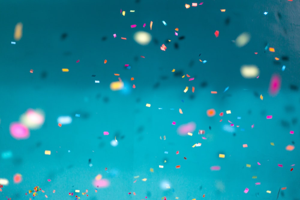 confetti on blue background